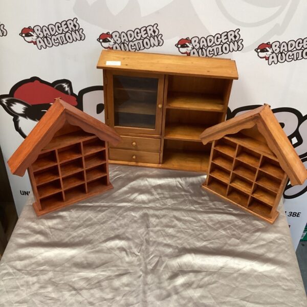 Vintage wooden storage racks for wall mounting.