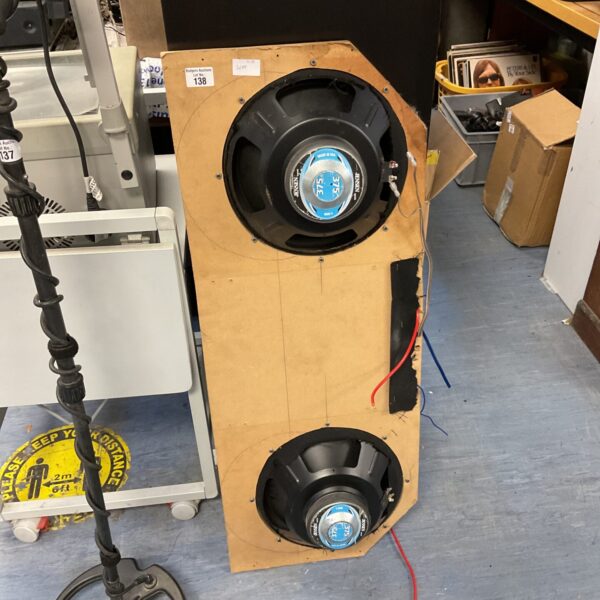 Vintage Jensen 375 subwoofers in wooden enclosures for car audio.