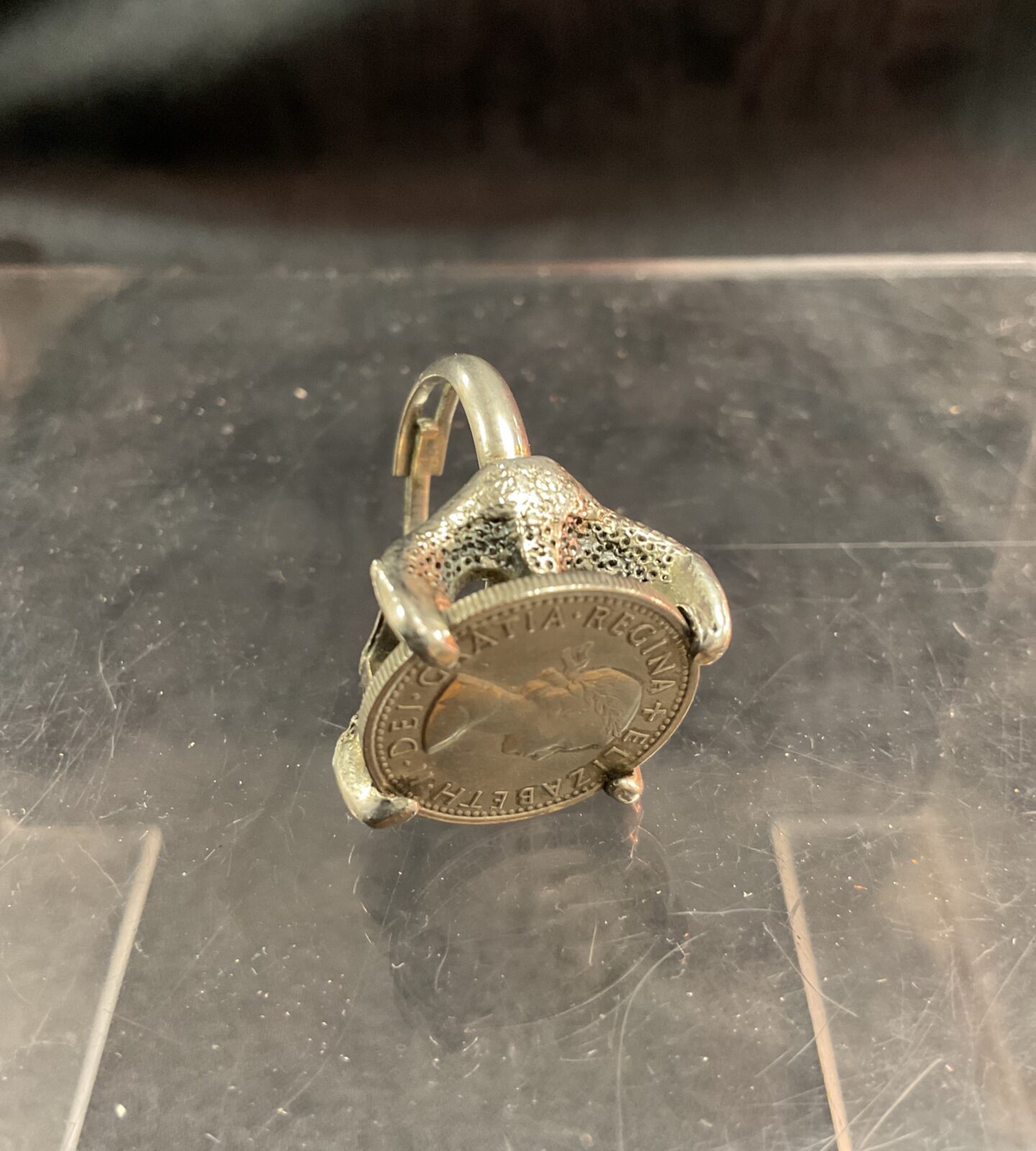 Vintage silver claw ring set with 1966 six pence size O