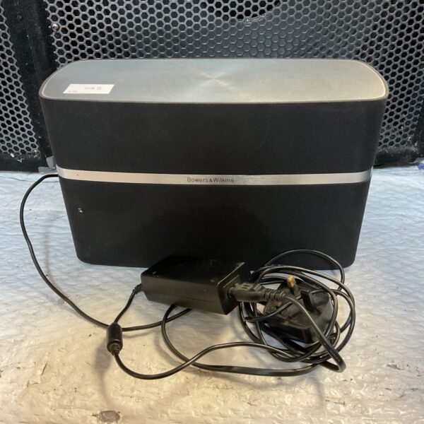 Bowers & Wilkins A5 wireless speaker in a home setting.