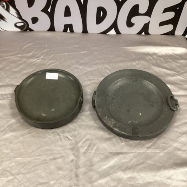 Antique Georgian pewter warming plate with aged patina.
