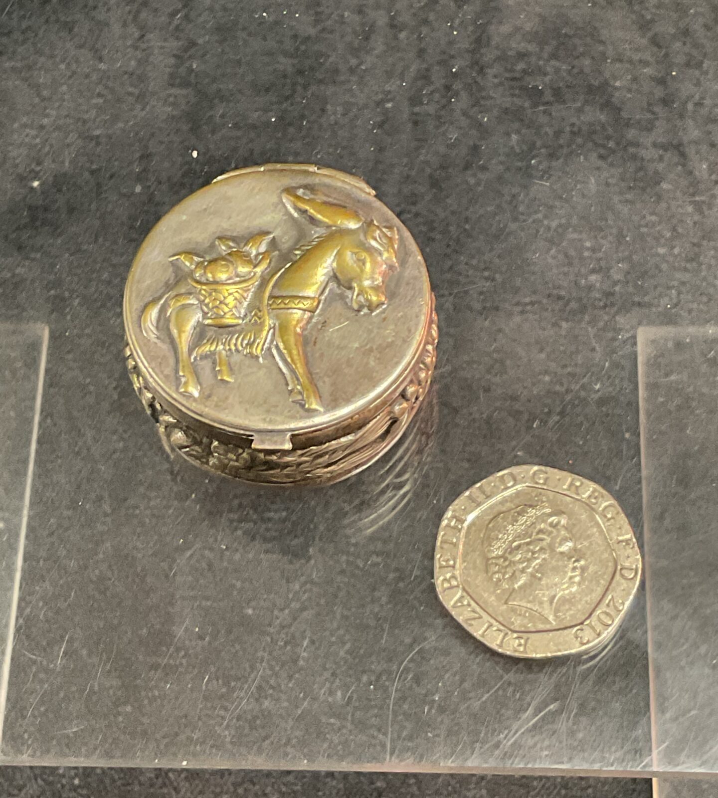 A Continental White Metal pill box with donkey decoration