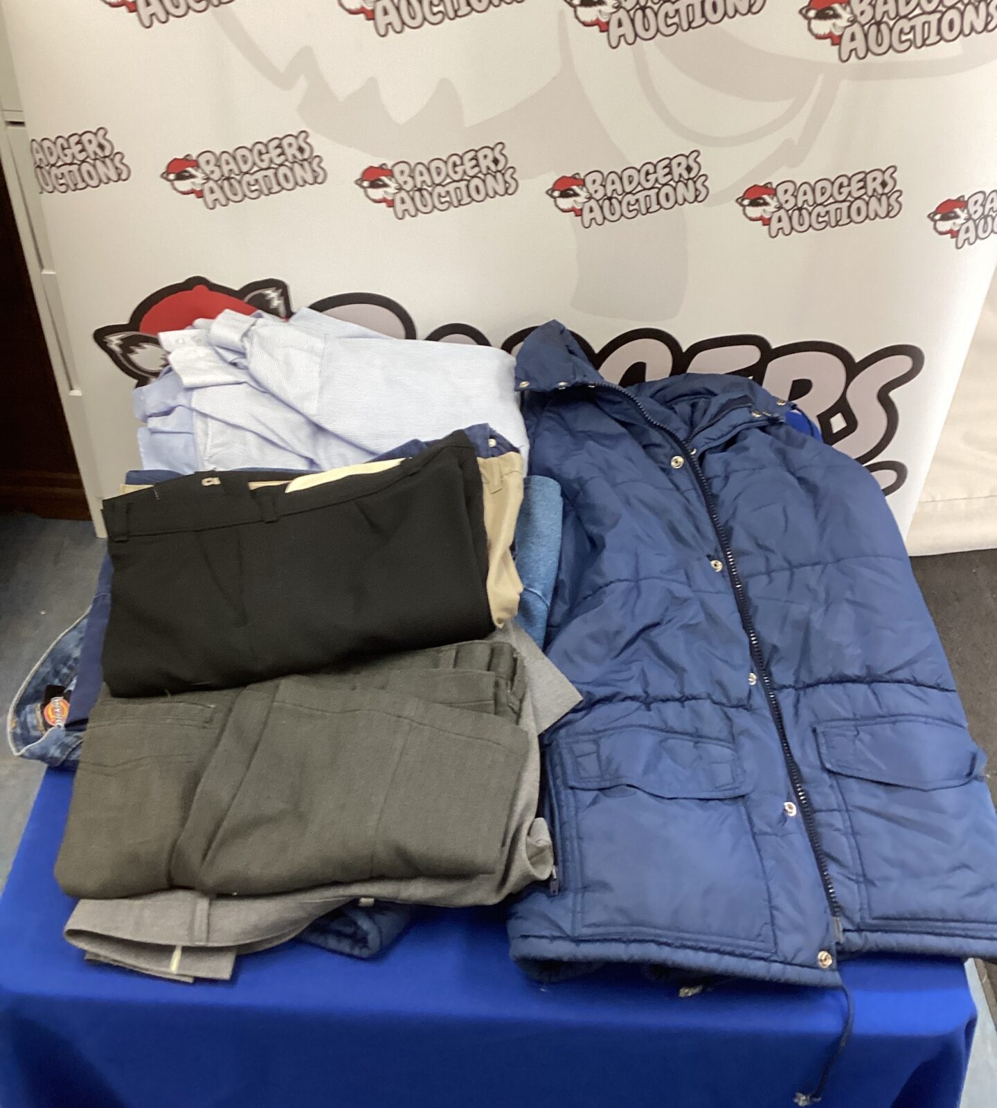 Quantity of mens clothing inc jeans and shirts