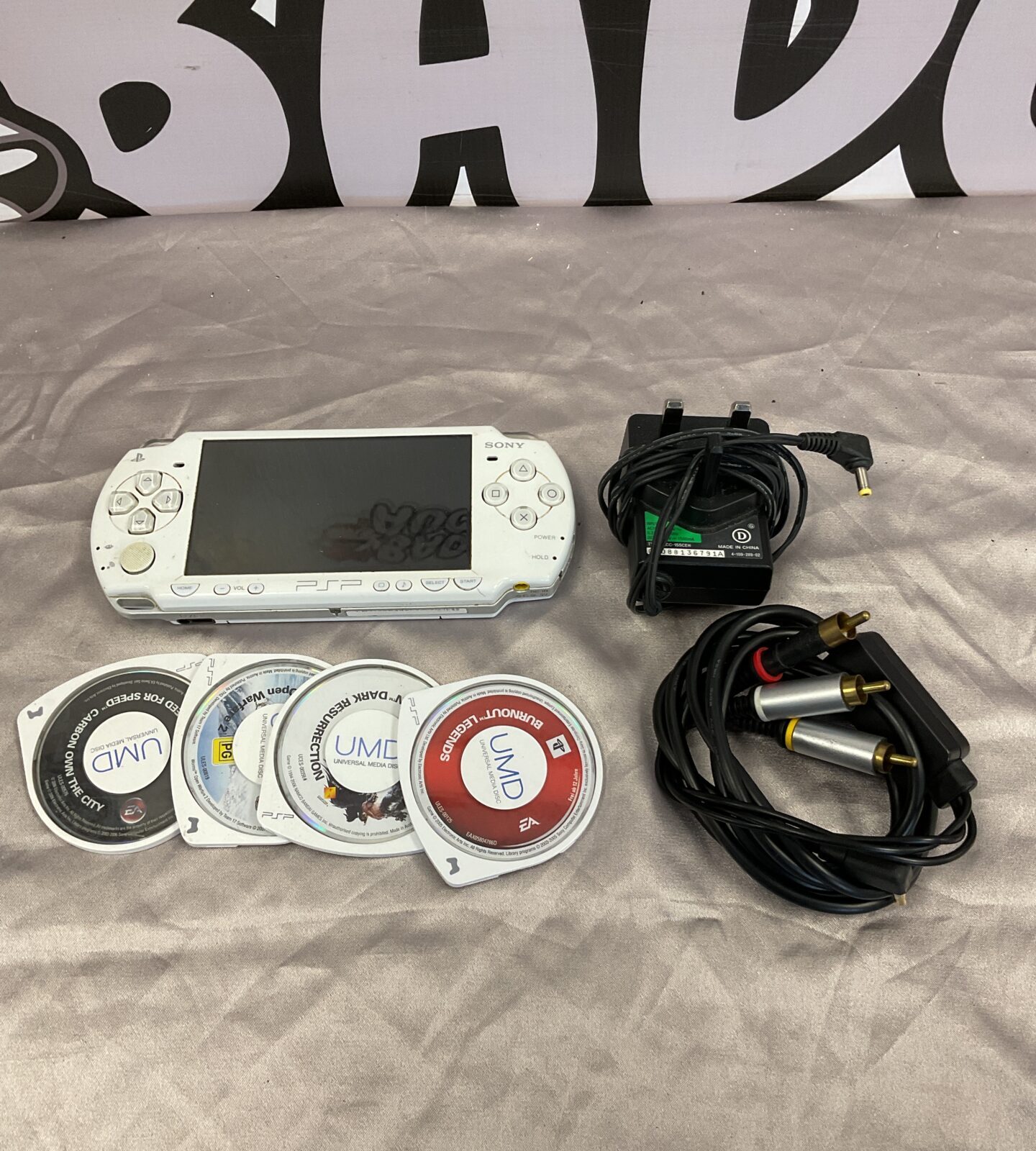 White sony psp console with games