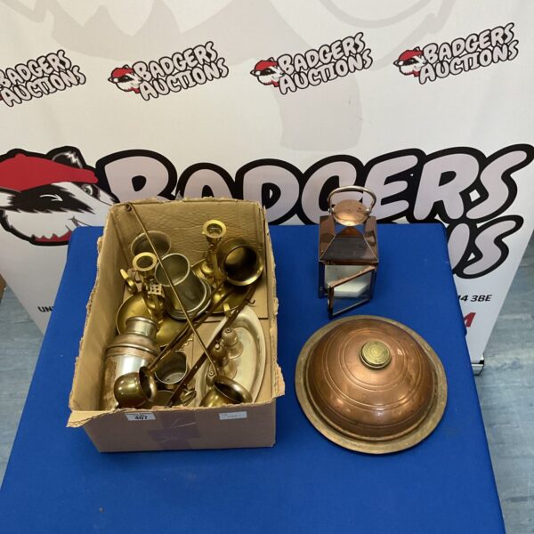 Vintage brass and copper lot featuring a decorative lantern and hot water bottle.