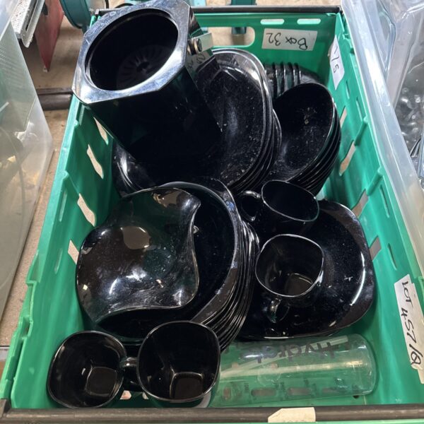 Black French dinner service with a boc bottle cooler