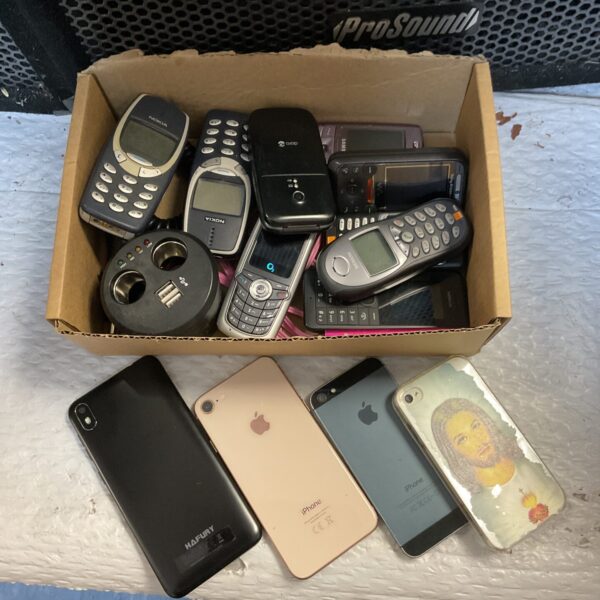 Tray of retro mobile phones inc nokia