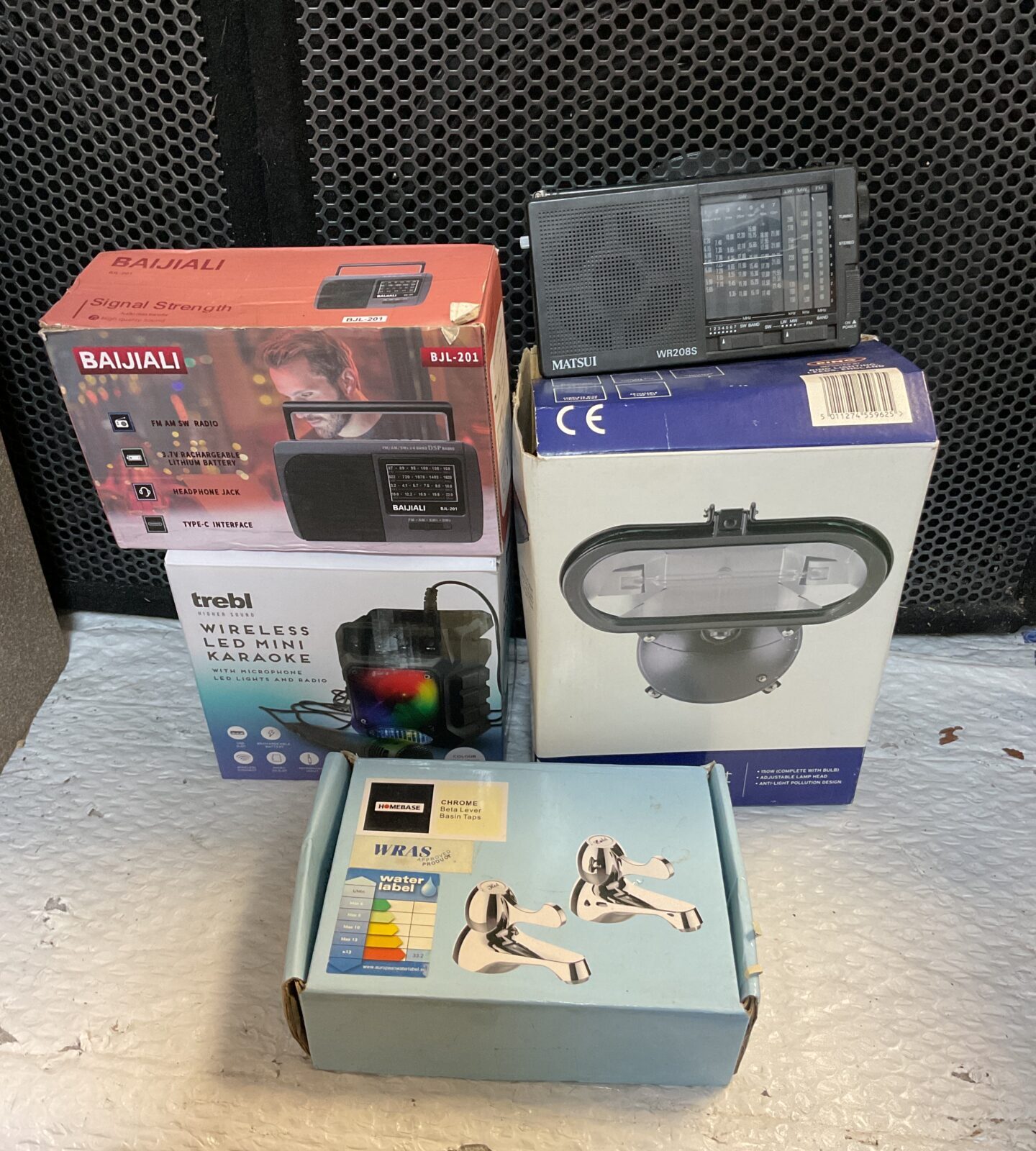 Two portable radios, trebl wireless led mini karaoke machine, floodlight & homebase taps
