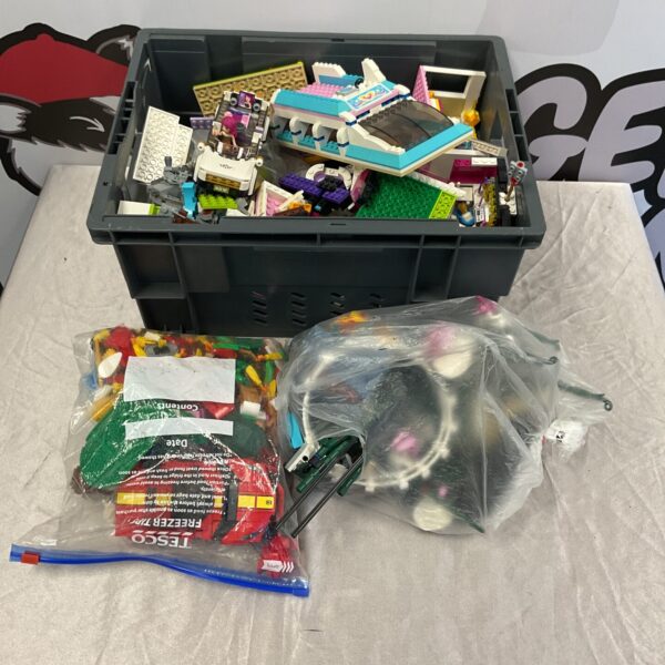 Colourful mixed Lego lot with Lego Friends pieces for building.