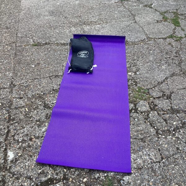 Purple Carnege yoga mat for fitness and exercise routines.