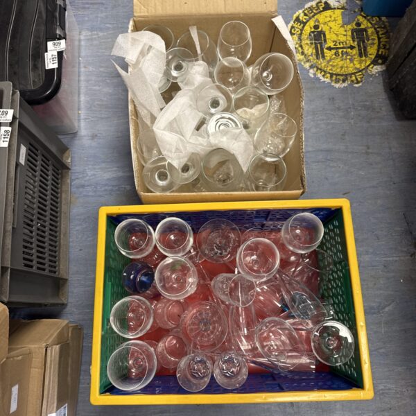 Mixed lot of assorted drinking glasses for beverages and entertaining.