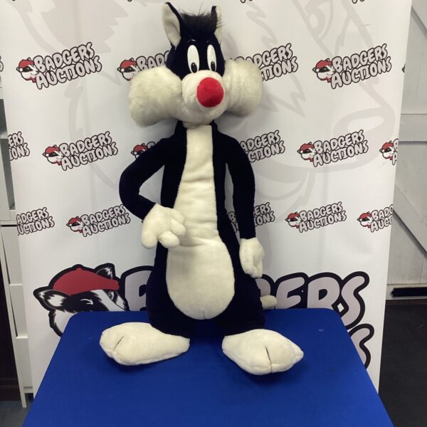 Vintage 1990s Warner Bros Sylvester plush toy, front view.