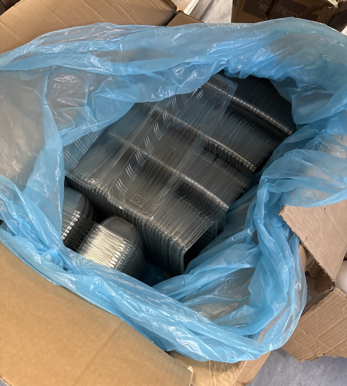 Box of plastic baguette trays