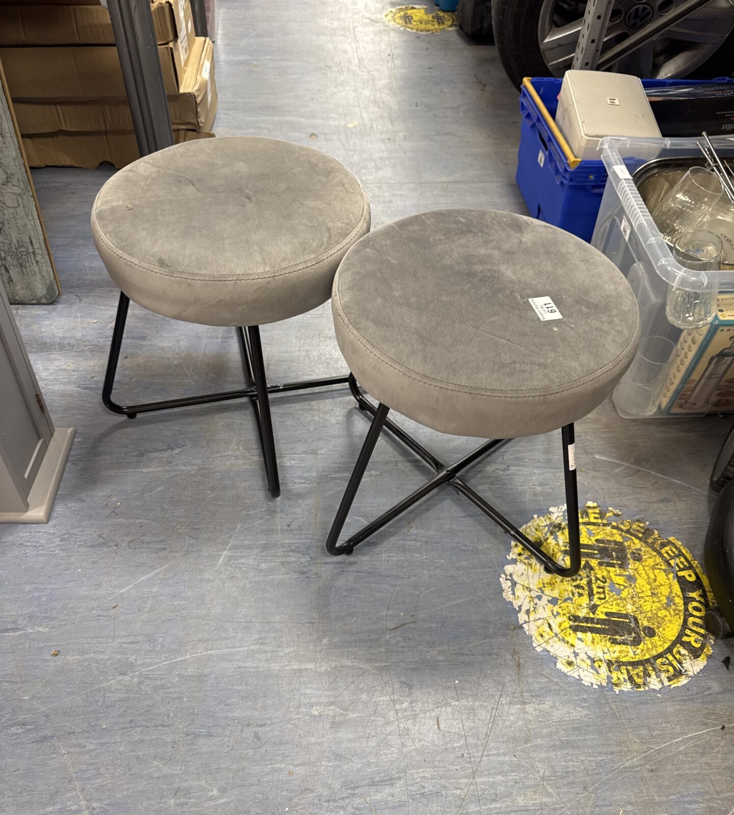 Two grey velour stools