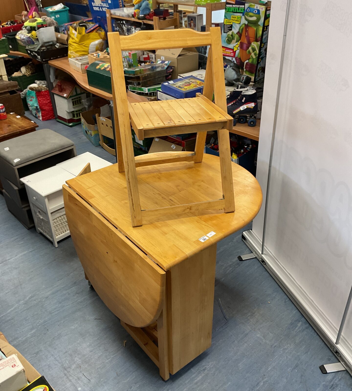 Folding oak table with 3 chairs contained