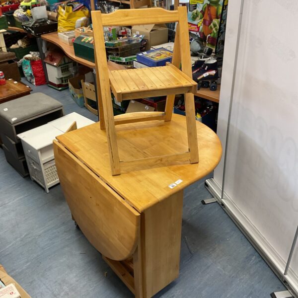 Folding oak table with 3 chairs contained