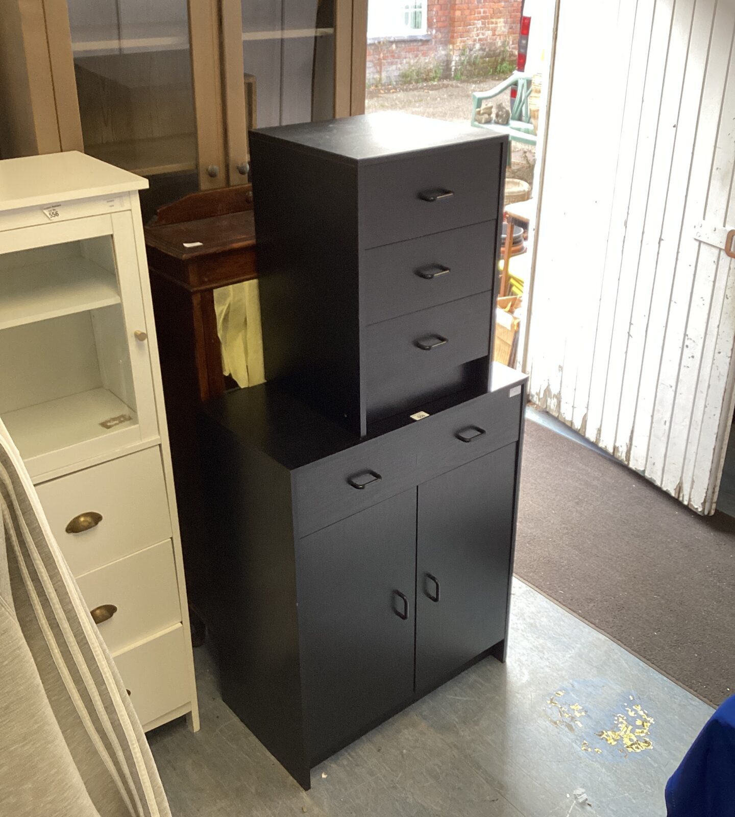 Two black wood effect units