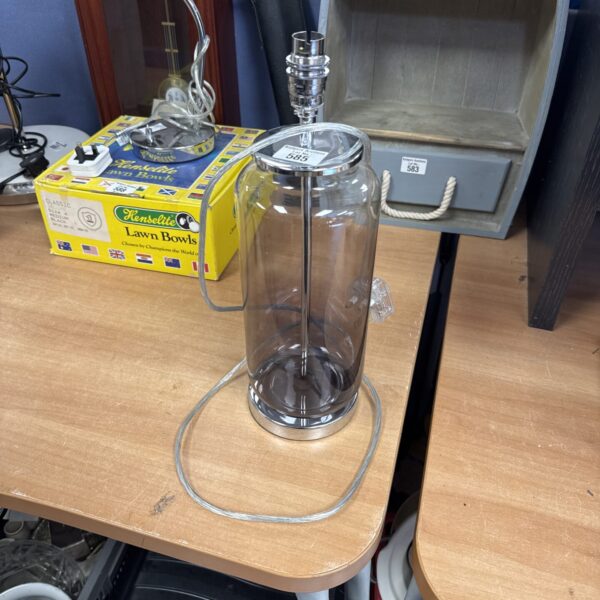 Stylish Dunelm smoked glass table lamp base for home lighting.