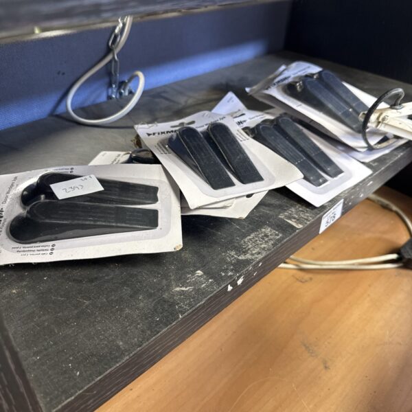New lot of Fixman rubber door stops for floor protection.