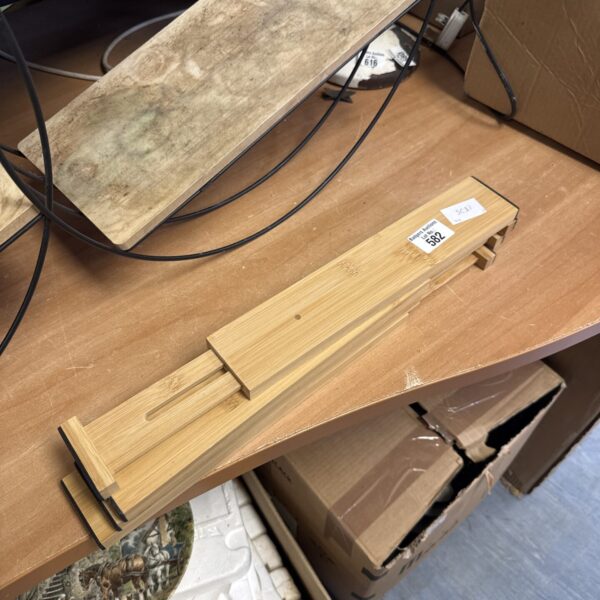 Set of four bamboo drawer dividers for kitchen organisation.