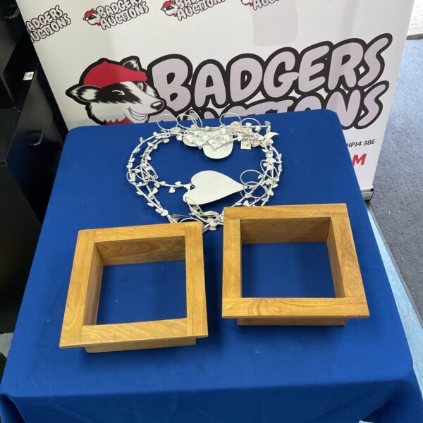 Wooden square shelves and heart shaped metal wall decor