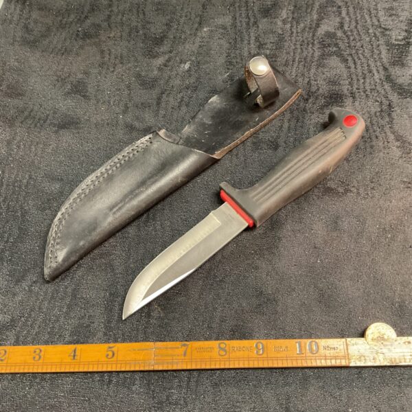 Kershaw Kai 1012 knife with black sheath, made in Japan.