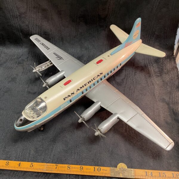 Vintage Schuko Pan American Clipper tinplate aeroplane side view.