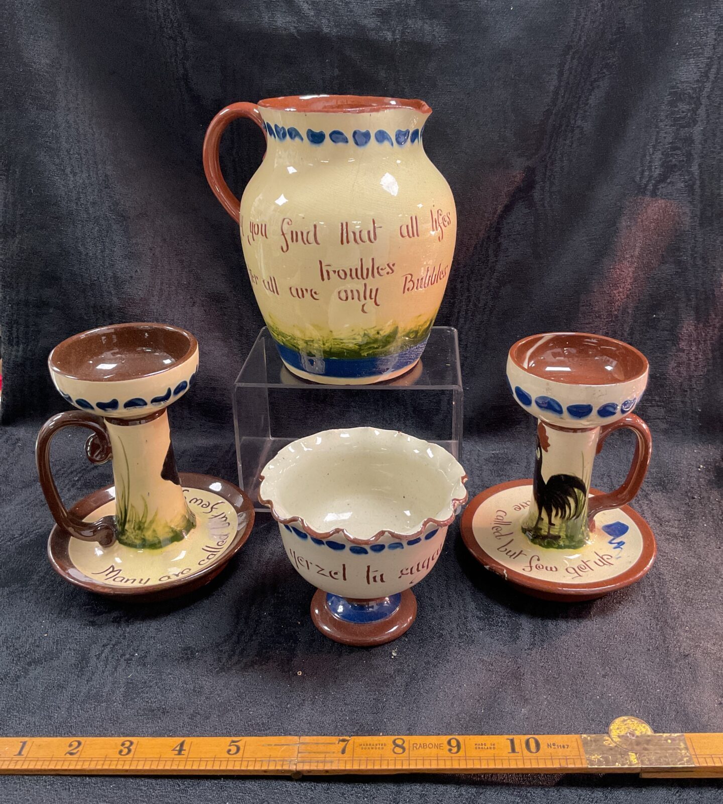 Four Torquay West Country pottery large jug two nightlights and a sugar bowl