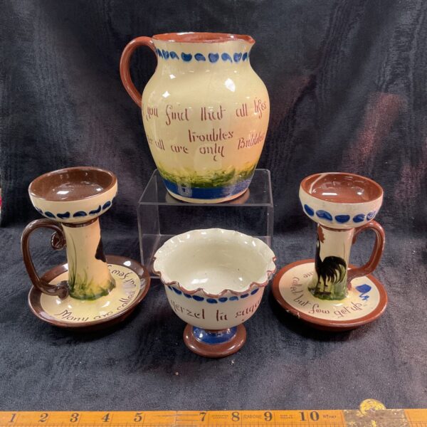 Four Torquay West Country pottery large jug two nightlights and a sugar bowl