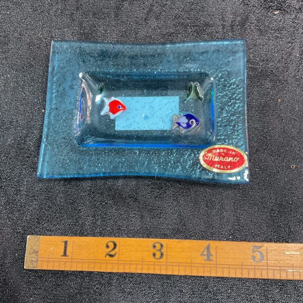 Vibrant Murano glass dish with a colourful fish design.