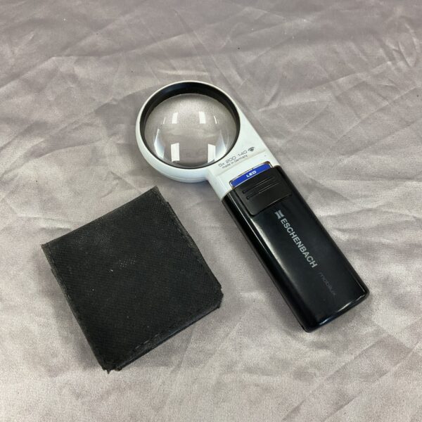 Eschenbach mobilux illuminated magnifier for reading and detail work.