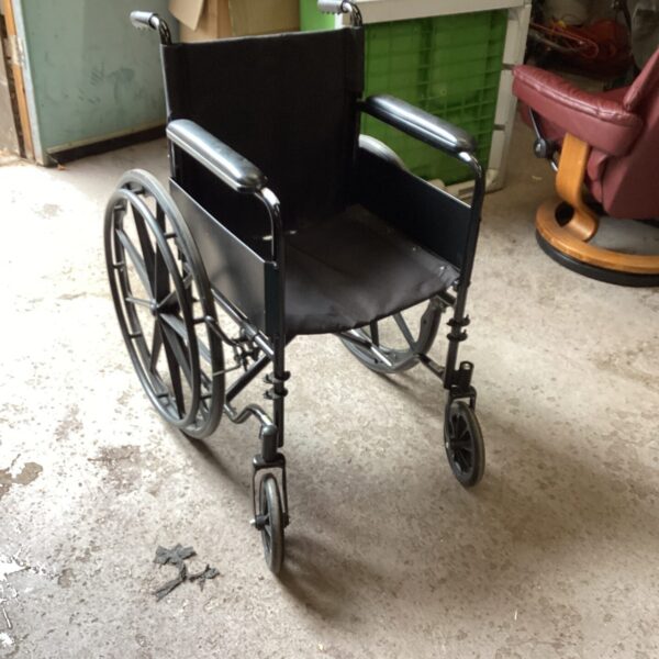 Black folding wheelchair with padded seat and metal frame.