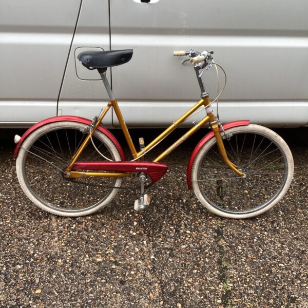 Vintage Raleigh Chicco bicycle in a retro style.