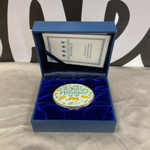 Halcyon Days enamel pot with floral design, silver anniversary collectible.