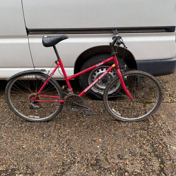 Vintage Diamondback Outlook mountain bike in red.