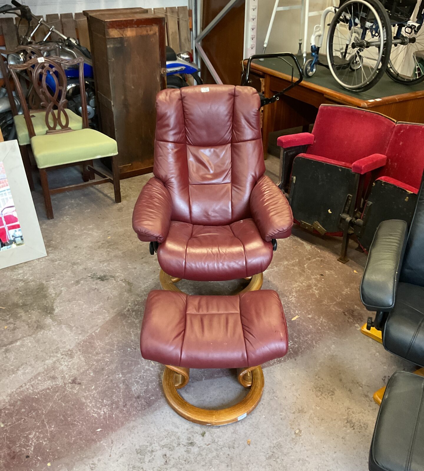 Reclining Red leather arm chair with foot stool
