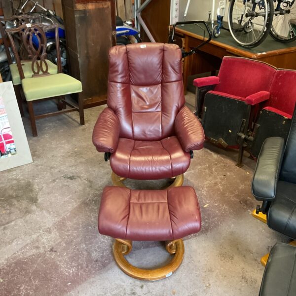 Reclining Red leather arm chair with foot stool
