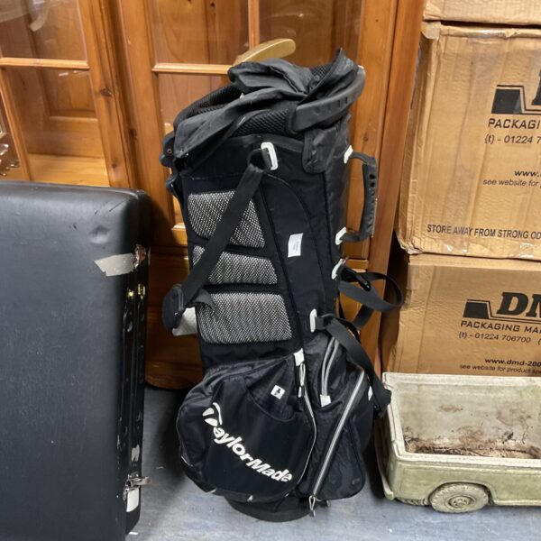 TaylorMade golf bag with putter storage, used condition.