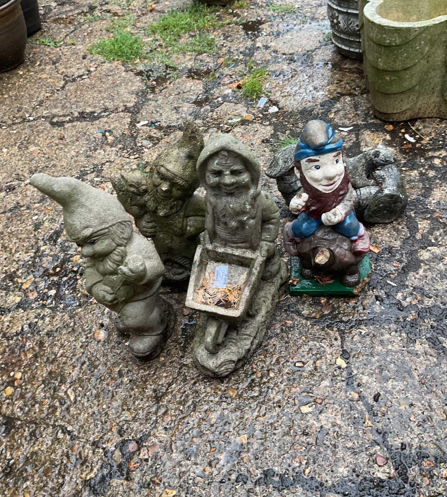Bundle of stone garden gnomes and squirrel