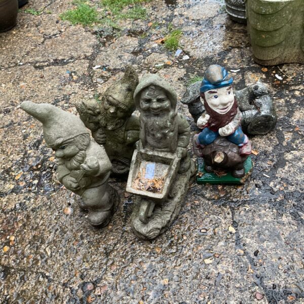 Bundle of stone garden gnomes and squirrel
