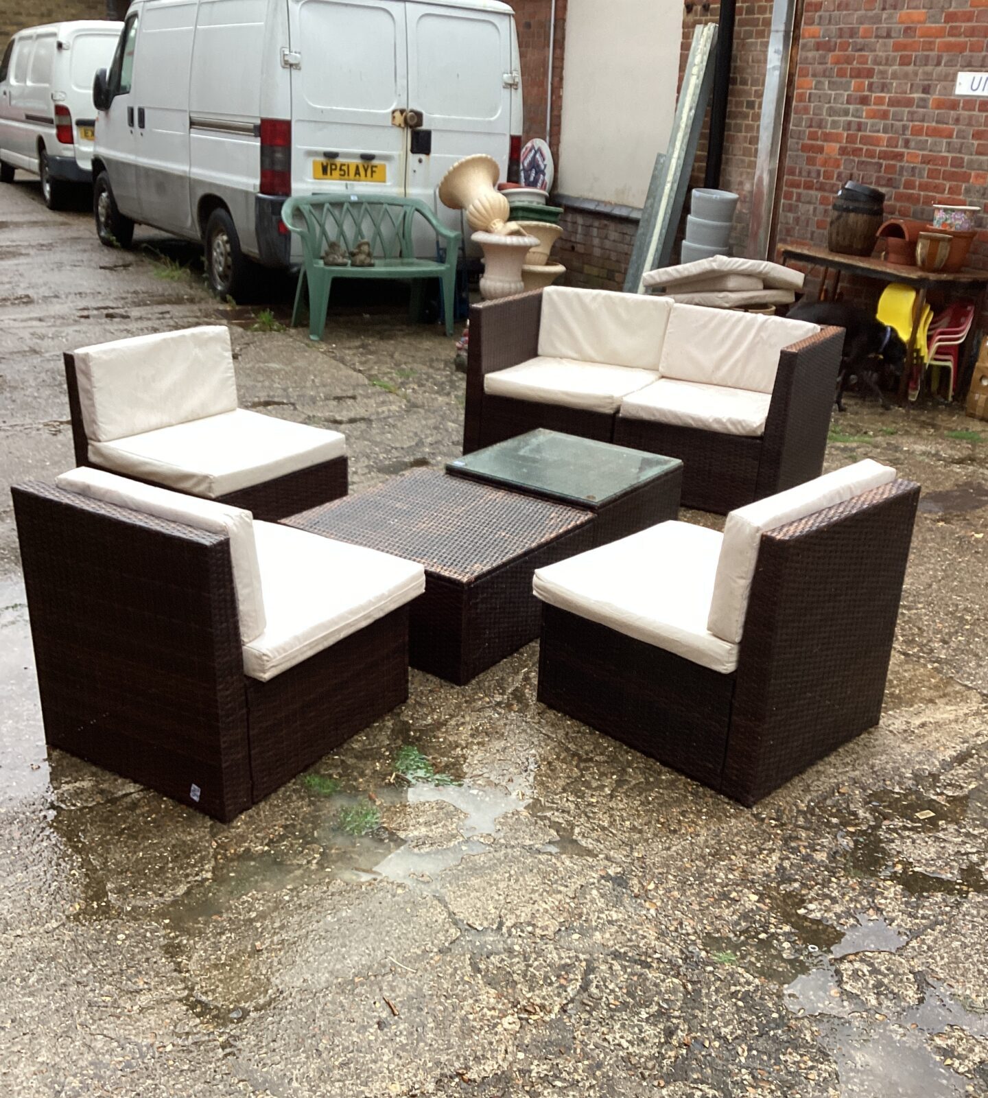 Set of raffia garden furniture with cushions