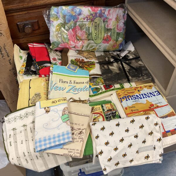 Box of new tea towels & vinyl tablecloth