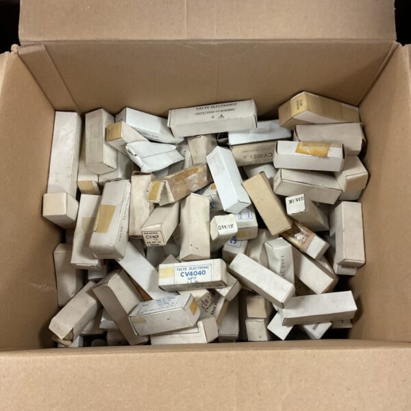 Vintage radio valve collection in original packaging.