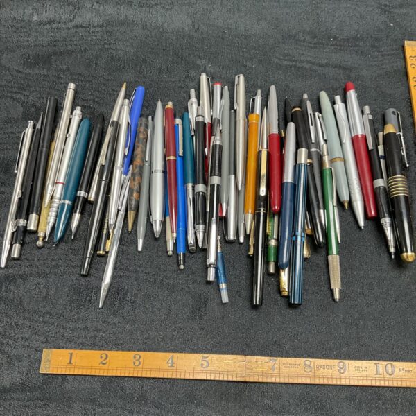 Large quantity of assorted pens and pencils