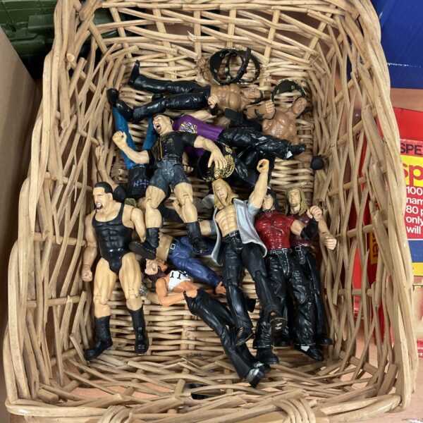 Vintage Jakks WWE wrestling figures from 1999 in a lot.