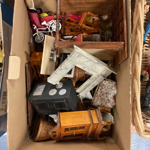 Vintage dollhouse furniture lot with miniature chairs and tables.