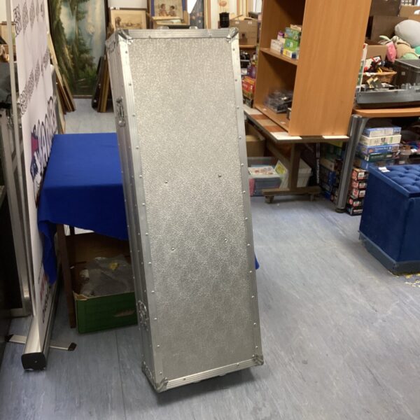 Silver aluminium flight case with locking latches.