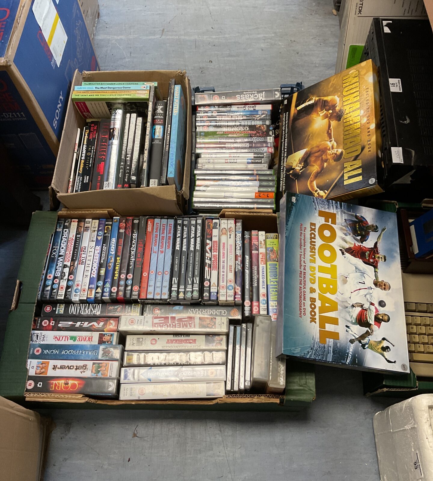 Three trays of dvds, games & books inc Xbox