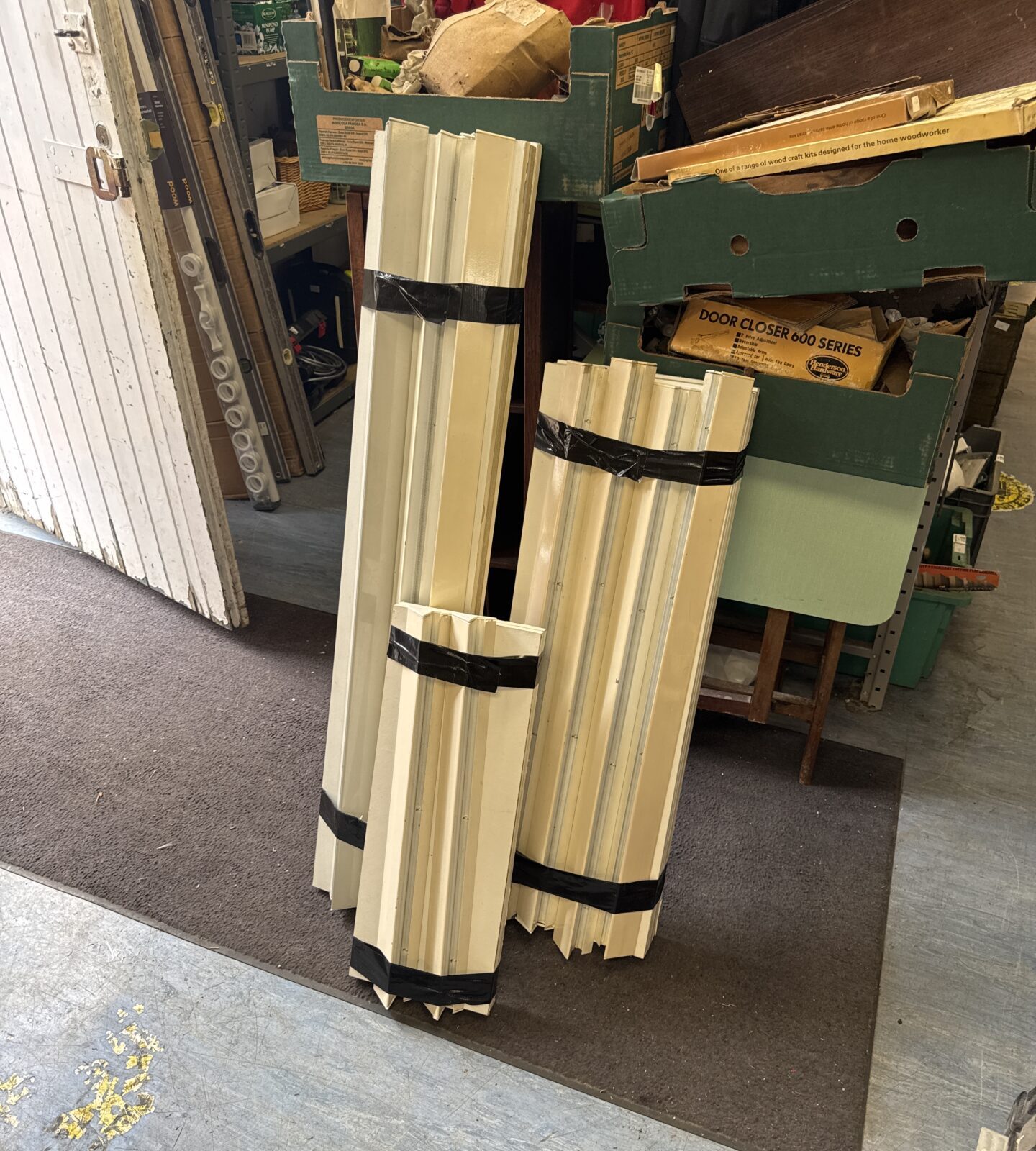 Three bundles of shelf units with wall brackets (3ft x 1ft, 4ft x 9 ins, 2ft x 9 ins)