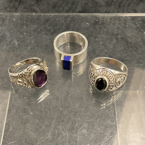 Vintage whitemetal ring with a purple stone setting.